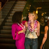 a woman wearing a pink dress