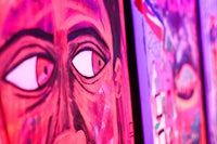 a group of colorful paintings on a wall